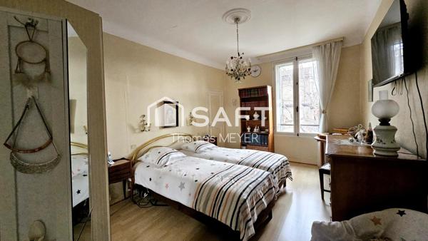 immeuble d'environ 140m² avec local commercial