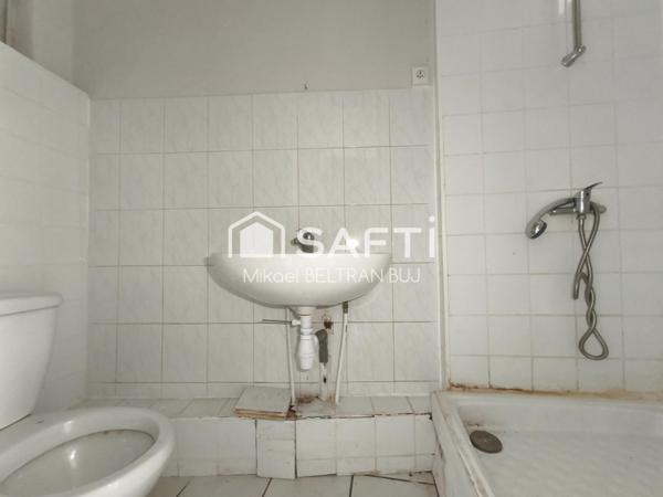 Immeuble de rapport comprenant 6 appartements dont un déjà loué