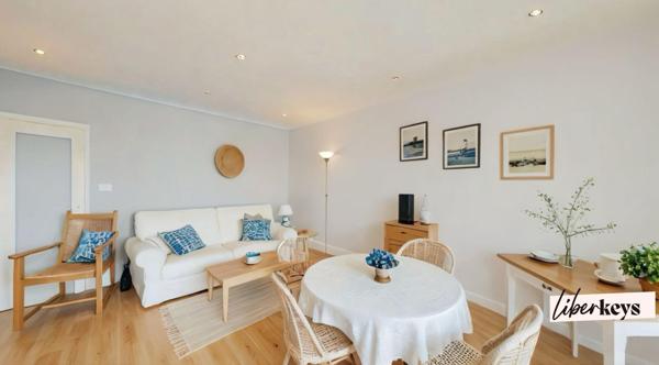 Appartement 24 m² avec grande terrasse vue montagne et place de parking 