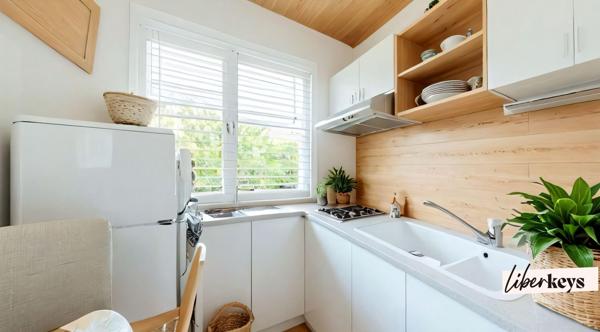 Appartement 24 m² avec grande terrasse vue montagne et place de parking 