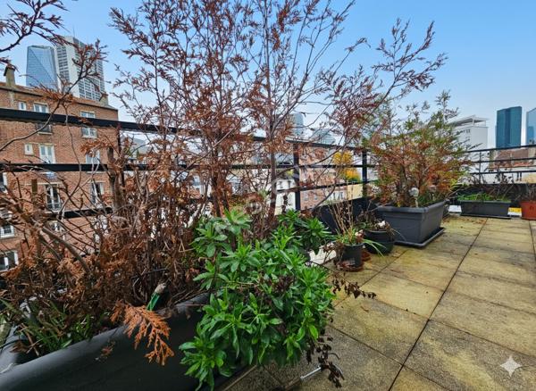 Puteaux Mairie : Appartement de Standing de 3 pièces avec 2 terrasses, cave et Parking