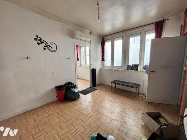 Vente petit Immeuble avec local à Grenoble – idéal projet de rénovation, opportunité de valorisation