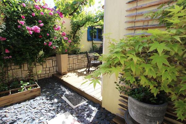 UNE MAISON RÉNOVÉE AVEC JARDIN, SUR KERFEUNTEUN -