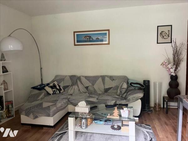 APPARTEMENT AVEC GARAGE ET PARKING