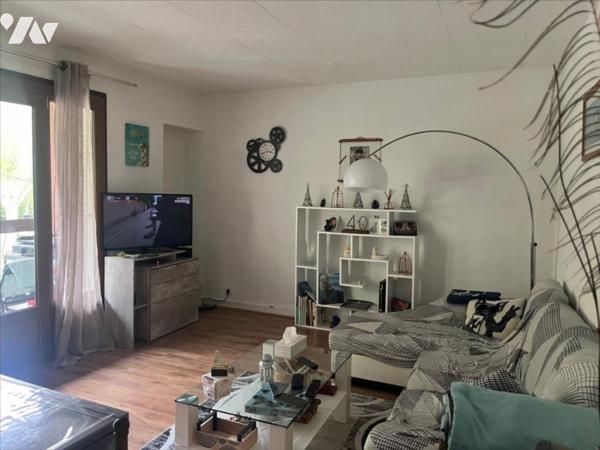 APPARTEMENT AVEC GARAGE ET PARKING