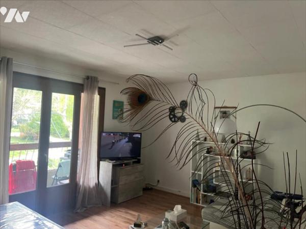 APPARTEMENT AVEC GARAGE ET PARKING