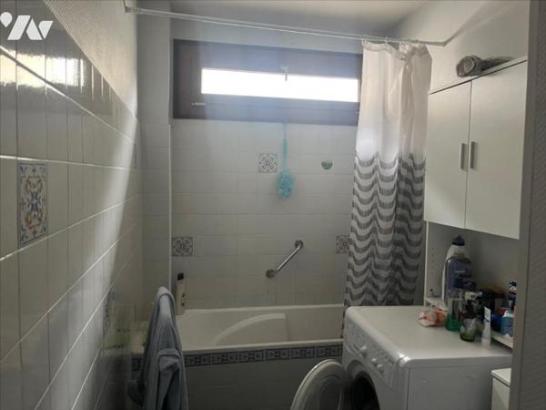 APPARTEMENT AVEC GARAGE ET PARKING