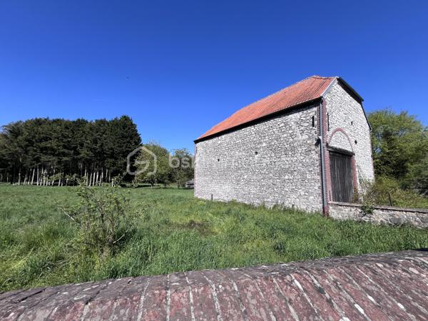 Vous recherchez un projet unique alliant cachet, volumes et possibilités d'aménagement ?
Cette ancienne grange représente une opportunité rare, idéale pour une résidence principale, un investissement locatif ou une activité professionnelle.  
Édifiée sur un terrain constructible de 753 m² (non viabilisé), cette grange développe 122 m² au sol avec possibilité d'aménager jusqu'à trois niveaux ainsi qu'une extension, sous réserve des autorisations d'urbanisme.
  Les gros travaux ont déjà été réalisés : charpente en excellent état, murs repris et toiture révisée.

LES ATOUTS :
• 122 m² au sol ;
• Terrain constructible de 753 m² ;
• Possibilité de créer jusqu'à trois niveaux ;
• Extension envisageable ;
• Charpente, murs et toiture en excellent état ;
• Environnement en zone naturelle, pas de constructions possible proche de la grange.

EXEMPLES DE PROJETS :
• Loft contemporain;
• Grande maison familiale;
• Division en logements / appartements (selon autorisations);
• Gîtes;
• Cabinet médical ou paramédical;
• Bureaux ou coworking;
• Atelier d'artisan ou d’artiste;
• Showroom.