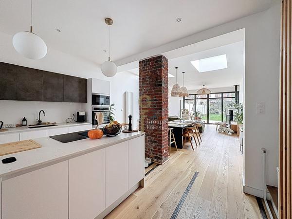 Maison rénovée avec extension – 120 m² – jardin, terrasse et garage, proche Croisé Laroche