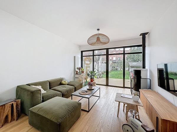 Maison rénovée avec extension – 120 m² – jardin, terrasse et garage, proche Croisé Laroche