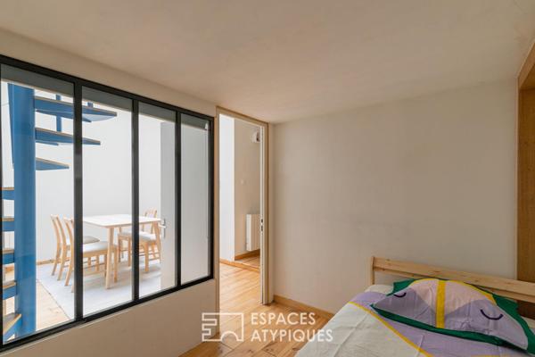 Ancien atelier confidentiel avec son patio au coeur de Belleville