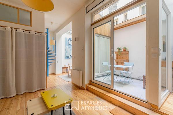 Ancien atelier confidentiel avec son patio au coeur de Belleville