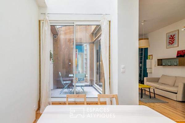 Ancien atelier confidentiel avec son patio au coeur de Belleville