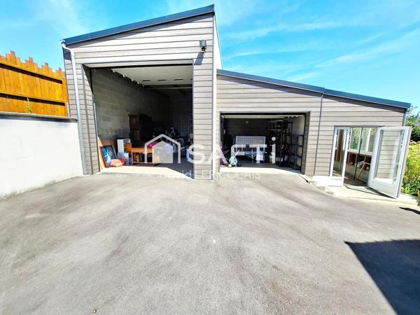 GRANDE MAISON AVEC SOUS SOL INTEGRAL ET HANGAR