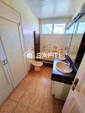 GRANDE MAISON AVEC SOUS SOL INTEGRAL ET HANGAR