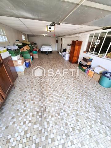 GRANDE MAISON AVEC SOUS SOL INTEGRAL ET HANGAR