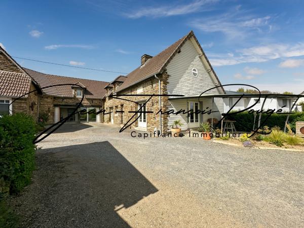 A 5 kilomètres du centre de Saint-Lô, maison de 2004 avec vie de plain-pied et cinq chambres !!!