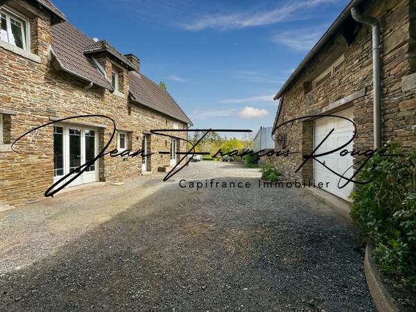 A 5 kilomètres du centre de Saint-Lô, maison de 2004 avec vie de plain-pied et cinq chambres !!!