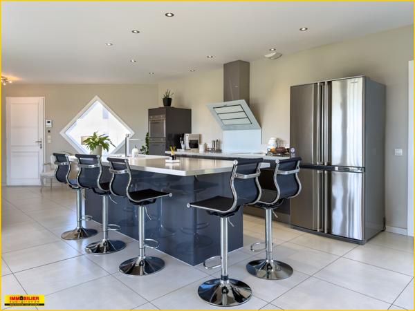 Maison 7 pièce(s) 4 chambre(s) 154 m²