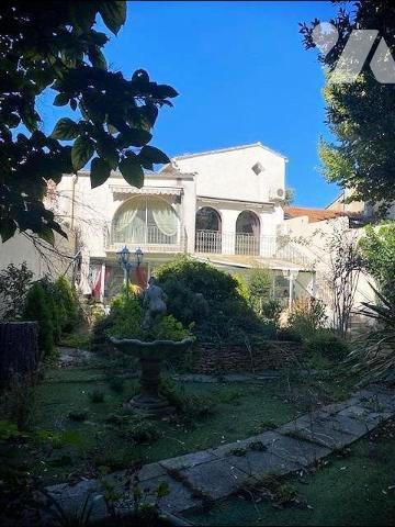 MAISON DE VILLAGE COMPOSEE DE 2 LOGEMENTS + JARDIN ET DOUBLE GARAGE