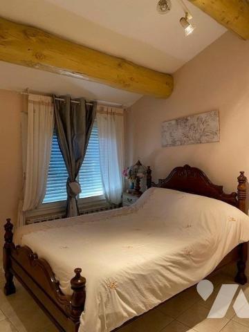 MAISON DE VILLAGE COMPOSEE DE 2 LOGEMENTS + JARDIN ET DOUBLE GARAGE