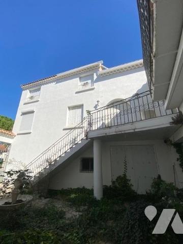 MAISON DE VILLAGE COMPOSEE DE 2 LOGEMENTS + JARDIN ET DOUBLE GARAGE