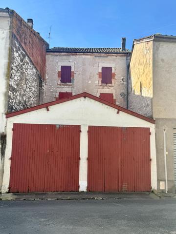 Immeuble de rapport – 2 appartements + 3 garages