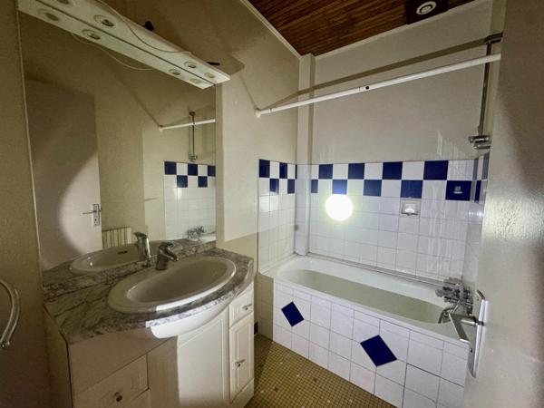 Immeuble de rapport – 2 appartements + 3 garages