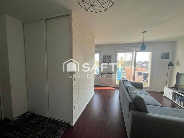 T2 avec une cave et une place de parking en résidence sécurisée