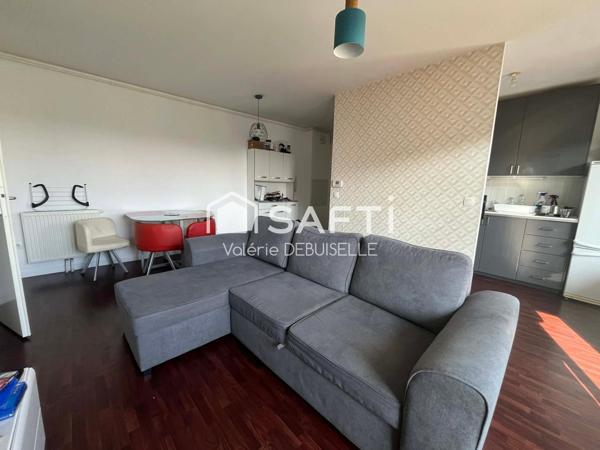 T2 avec une cave et une place de parking en résidence sécurisée