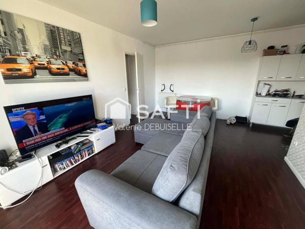 T2 avec une cave et une place de parking en résidence sécurisée