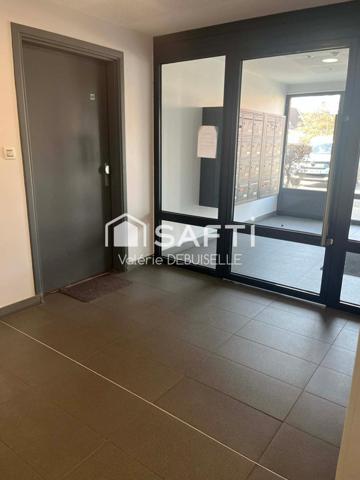 T2 avec une cave et une place de parking en résidence sécurisée