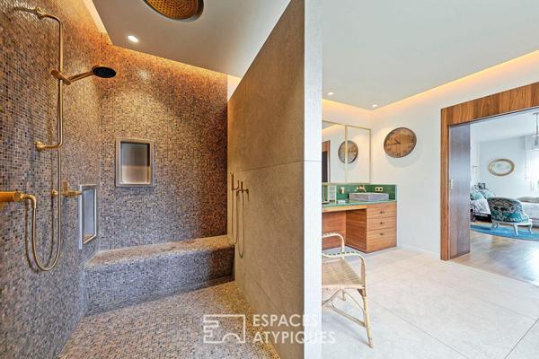 La maison contemporaine avec espace bien être et jardin paysagé
