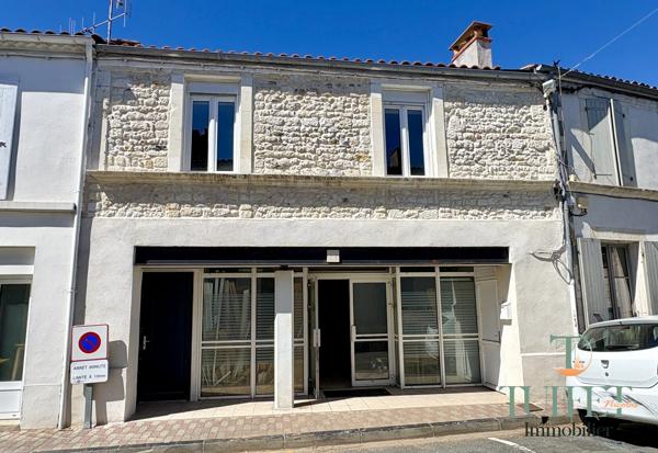 Immeuble avec local commercial et appartement en plein centre ville