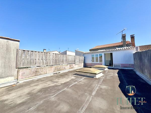 Immeuble avec local commercial et appartement en plein centre ville