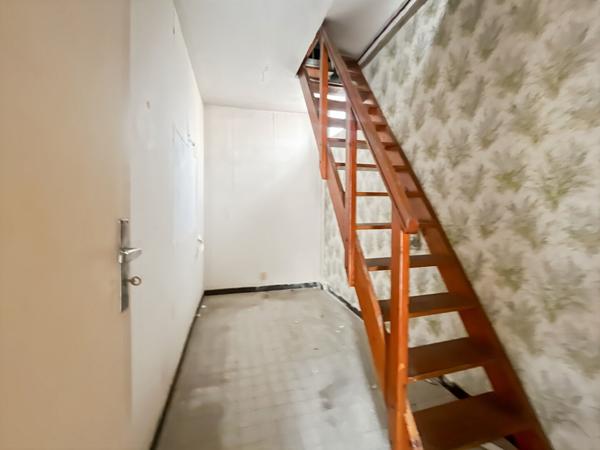 Triplex avec toit-terrasse Fort potentiel (travaux à prévoir)