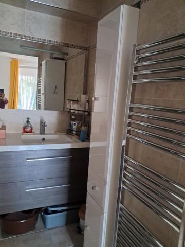 Logement avec terrasse couverte