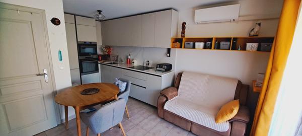 Logement avec terrasse couverte