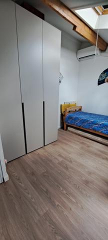 Logement avec terrasse couverte