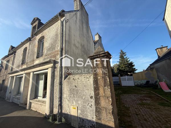 IMMEUBLE DE RAPPORT AVEC 3 LOGEMENTS ET UN JARDIN