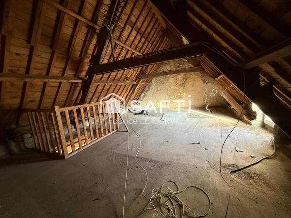 IMMEUBLE DE RAPPORT AVEC 3 LOGEMENTS ET UN JARDIN