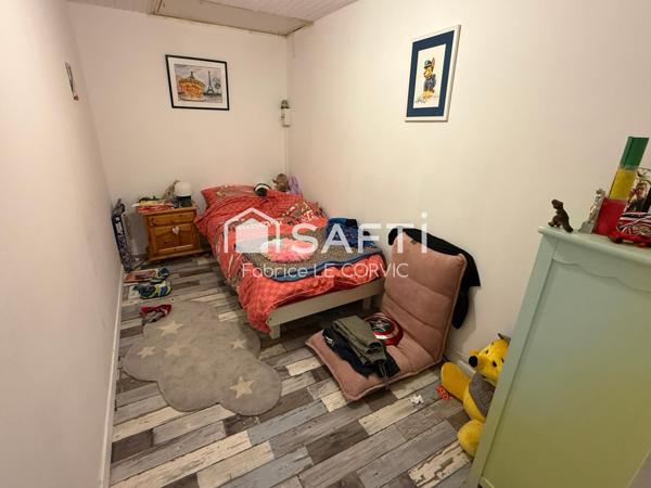 IMMEUBLE DE RAPPORT AVEC 3 LOGEMENTS ET UN JARDIN