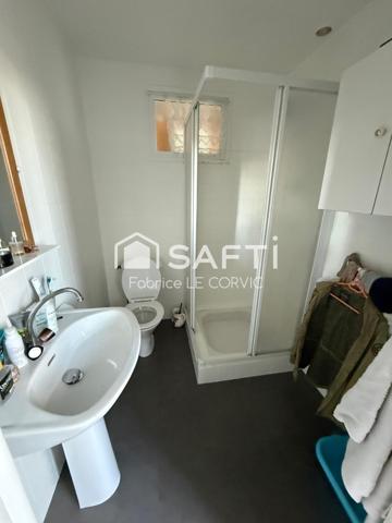 IMMEUBLE DE RAPPORT AVEC 3 LOGEMENTS ET UN JARDIN