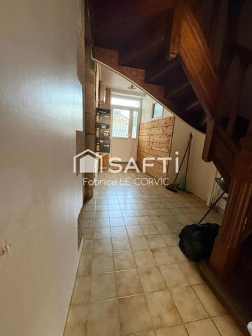 IMMEUBLE DE RAPPORT AVEC 3 LOGEMENTS ET UN JARDIN