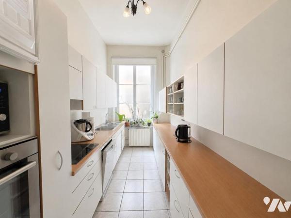 Appartement rue de la Monnaie T6 avec garage et ascenseur 