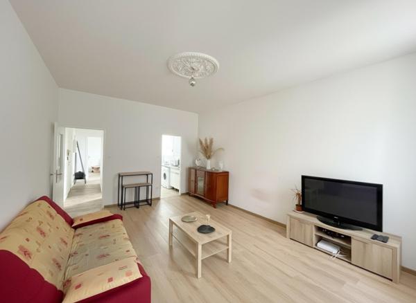 À découvrir : appartement lumineux de 50 m² avec cave et espace extérieur