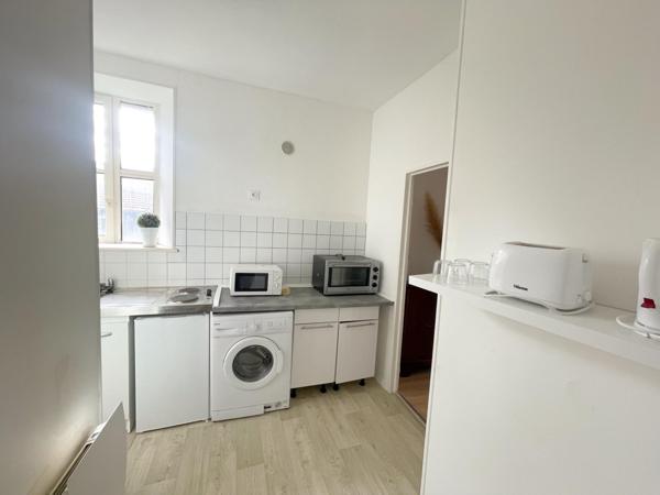 À découvrir : appartement lumineux de 50 m² avec cave et espace extérieur