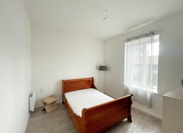 À découvrir : appartement lumineux de 50 m² avec cave et espace extérieur