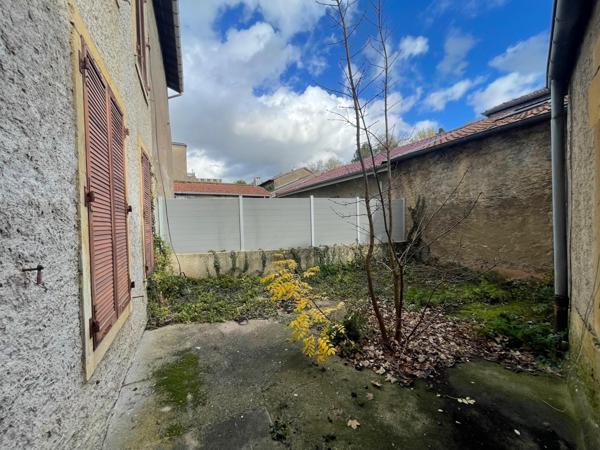 À découvrir : appartement lumineux de 50 m² avec cave et espace extérieur