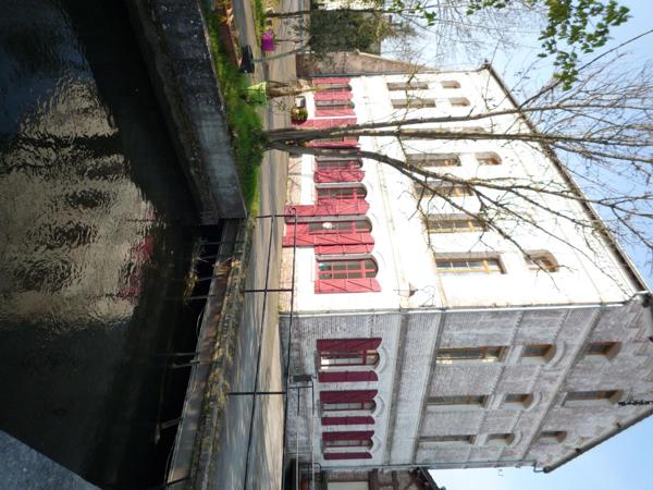 Moulin d'exception au centre d'une ville dynamique